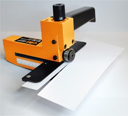 Coupeuse de bandes pour laminés et bois de placage